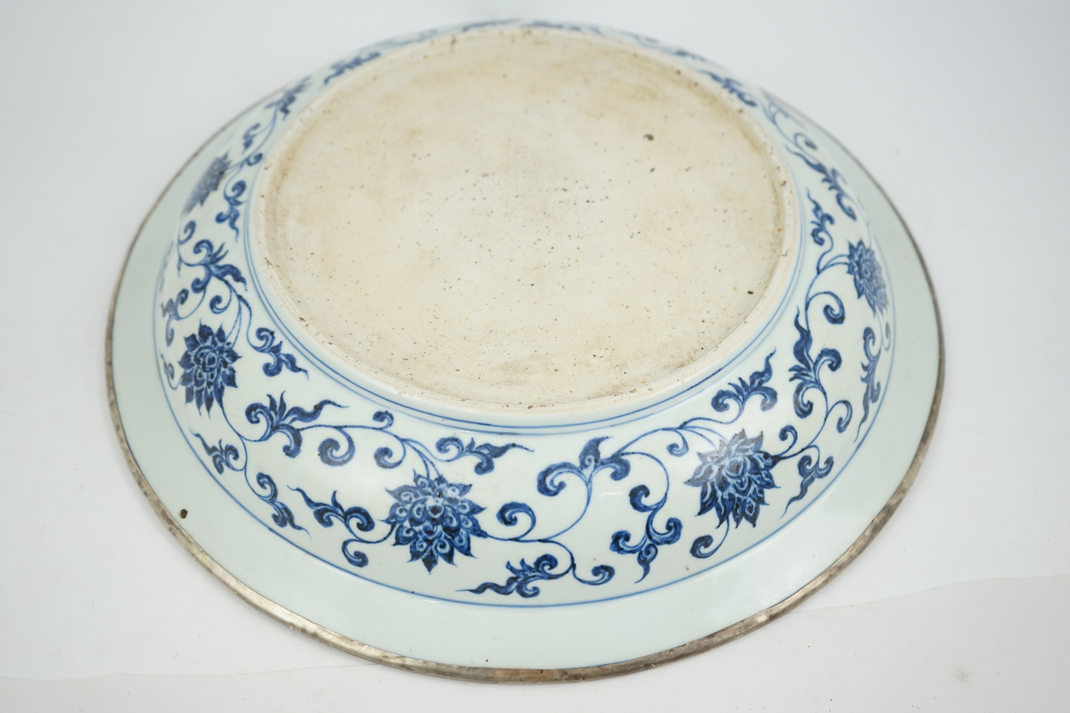 A large Chinese Ming style blue and white dish, possibly 18th century